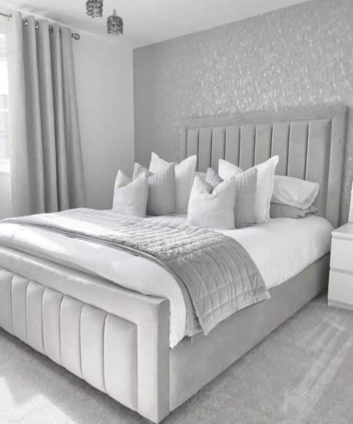 Sleigh Bed in Grey soft velvet with a 54 inch high headboard in panel style with bumper borders and a similar design footend named as Berlin Bed in Super King size