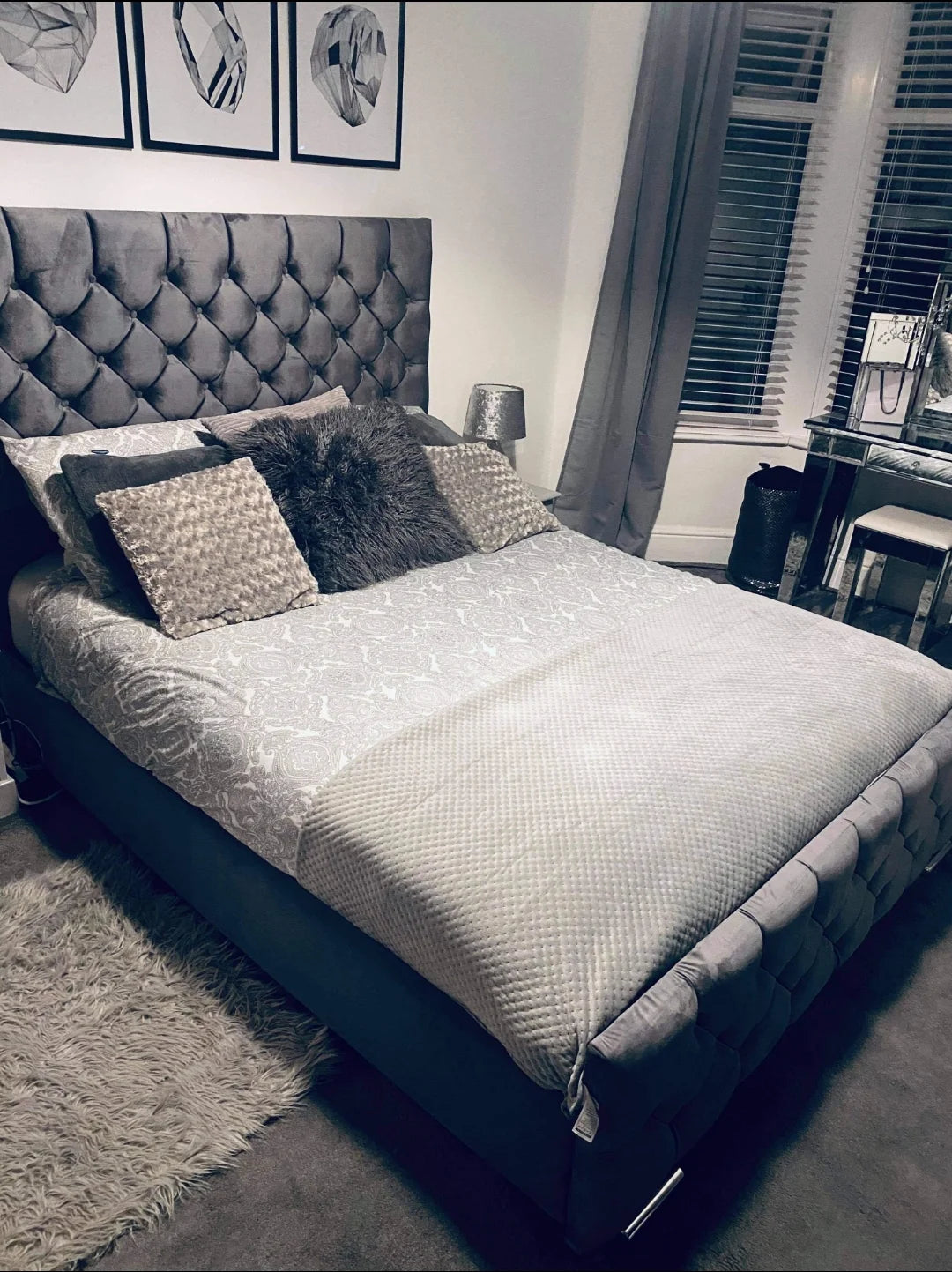 Sleigh Bed in Soft Velvet with a 47 inch high headboard in Chesterfield style with matching fabric buttons and a chesterfield style with matching fabric buttons footboard named as Stockholm Bed in Double size